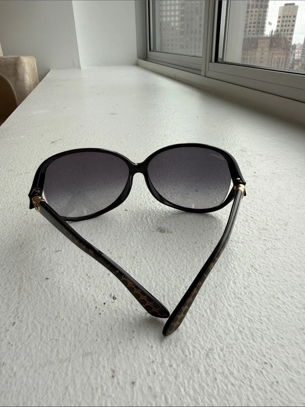 Gucci Black Oversized Oval Sunglasses with Heart Accent
